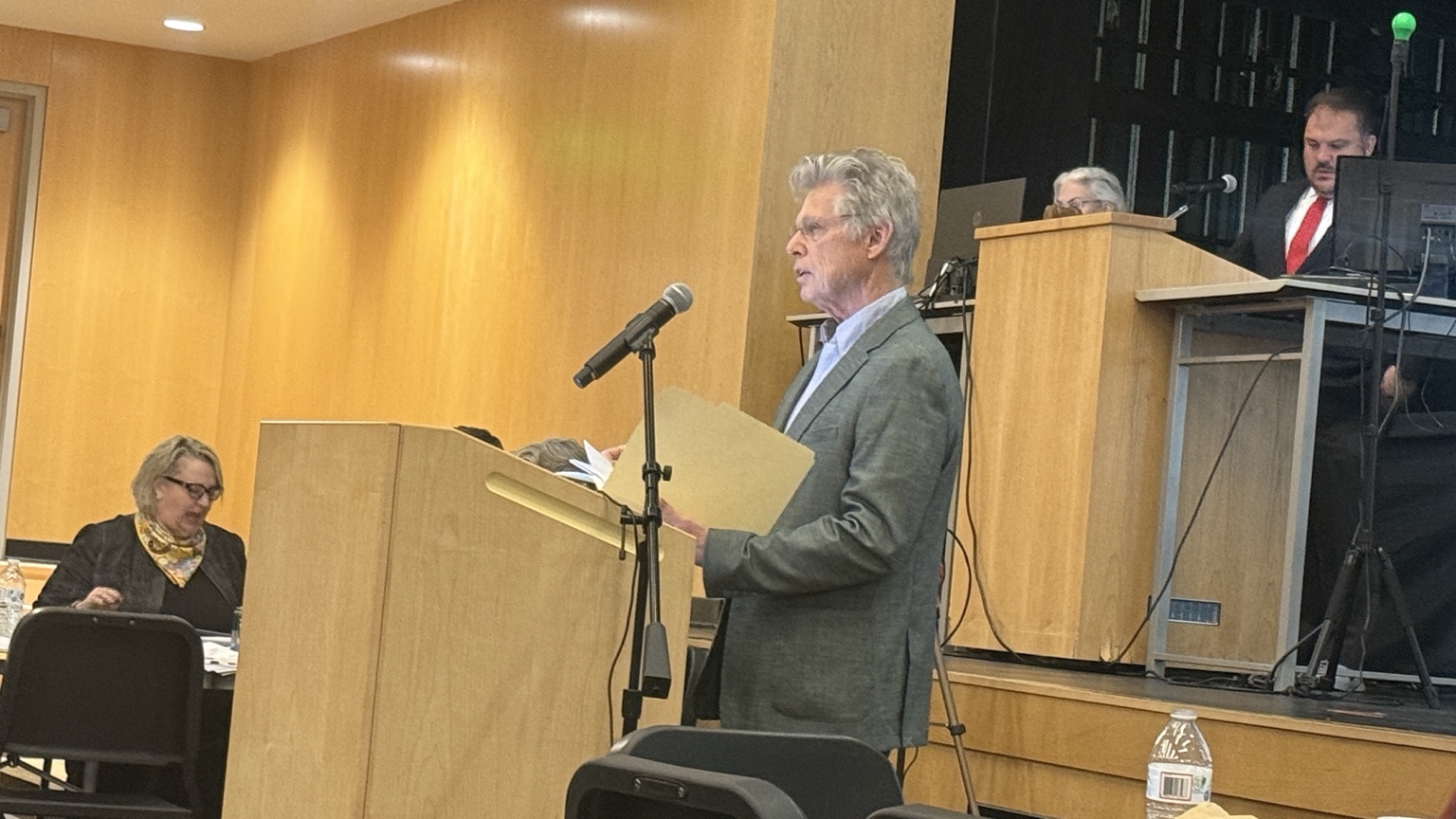 Citizen petitioner John Healey presents Article 42 at the Town Meeting podium