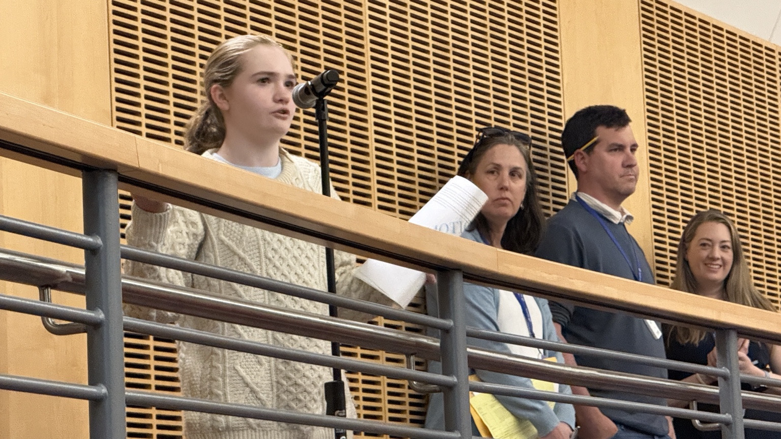 Lilly Ryan, a Winchester student, addresses Town Meeting on the FY27 budget